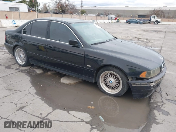 2001 BMW 5 Series 525iA with VIN WBADT43451GX20026, listed as a IAAI auction lot 41490075 with 141,700 mi miles. Bid and sale history available at carsss.com. Image 1.