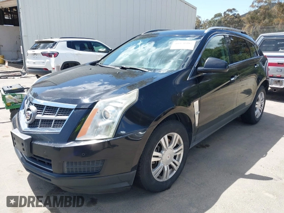 2012 Cadillac SRX Luxury Collection with VIN 3GYFNAE38CS635205, listed as a IAAI auction lot 41970482 with 220,593 mi miles and . Bid and sale history available at DreamBid. Image 2.