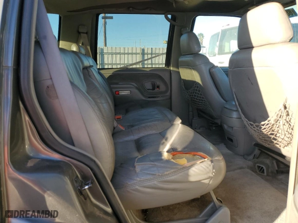 1999 Chevrolet Tahoe with VIN 1GNEC13R6XJ364173, listed as a Copart auction lot 88271575 with 196,935 mi miles and Salvage Title. Bid and sale history available at carsss.com. Image 11.