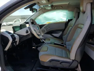 2017 BMW i3 with VIN WBY1Z8C37HV895076, listed as a Copart auction lot 60131235 with 104,753 mi miles and Salvage title. Bid and sale history available at DreamBid. Image 7.