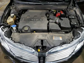2014 Lincoln MKZ z VIN 3LN6L2JKXER819971, wystawiony jako Copart lot #49979115 z przebiegiem 132 602 mil mil oraz Szkoda całkowita • Salvage title. Historia ofert i sprzedaży dostępna na DreamBid. Obrazek 12.