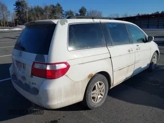 2007 Honda Odyssey EX with VIN 5FNRL38417B055298, listed as a IAAI auction lot 39332584 with 232,760 mi miles. Bid and sale history available at carsss.com. Image 4.