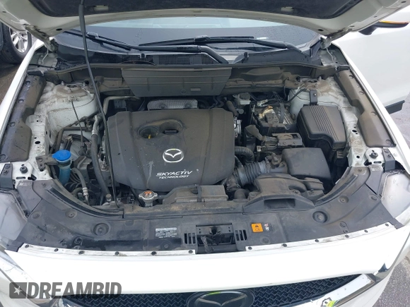 2018 Mazda CX-5 Touring with VIN JM3KFBCMXJ0366008, listed as a IAAI auction lot 42079989 with 153,868 mi miles and . Bid and sale history available at DreamBid. Image 10.