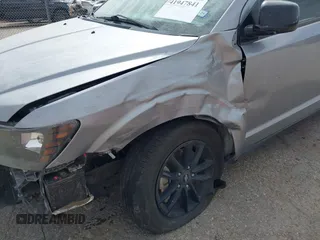 2019 Dodge Journey SE z VIN 3C4PDCBB5KT861358, wystawiony jako IAAI lot #41947841 z przebiegiem 82 099 mil mil oraz . Historia ofert i sprzedaży dostępna na DreamBid. Obrazek 17.