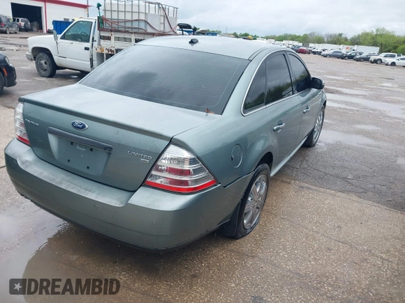 2008 Ford Taurus Limited with VIN 1FAHP28W08G161766, listed as a IAAI auction lot 41809990 with 244,959 mi miles. Bid and sale history available at carsss.com. Image 4.