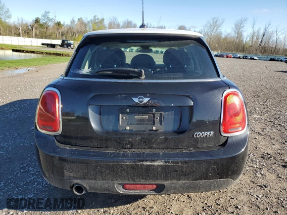 2016 MINI Hardtop 4 Door with VIN WMWXU1C50G2D09465, listed as a Copart auction lot 54975005 with 62,715 mi miles and Salvage Title. Bid and sale history available at DreamBid. Image 6.
