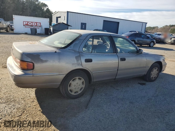 1992 Toyota Camry LE with VIN 4T1SK12E3NU104088, listed as a Copart auction lot 47496735 with 174,957 mi miles and Salvage Title. Bid and sale history available at carsss.com. Image 3.
