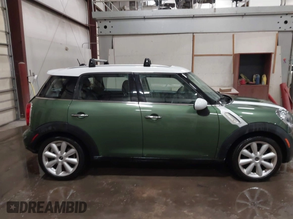 2015 MINI Countryman with VIN WMWZB3C50FWR43714, listed as a IAAI auction lot 41589778 with 93,404 mi miles and . Bid and sale history available at DreamBid. Image 13.