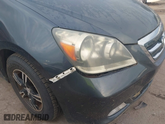 2006 Honda Odyssey TOURING with VIN 5FNRL38816B057196, listed as a IAAI auction lot 42106856 with 186,566 mi miles. Bid and sale history available at carsss.com. Image 6.