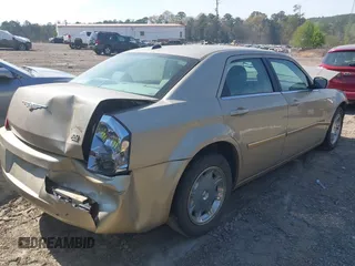 2006 Chrysler 300 Touring with VIN 2C3KA53G26H230479, listed as a IAAI auction lot 41871247 with 91,997 mi miles. Bid and sale history available at carsss.com. Image 4.
