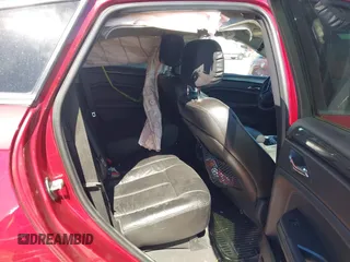2014 Cadillac SRX with VIN 3GYFNAE36ES597007, listed as a IAAI auction lot 41675527 with 105,613 mi miles and . Bid and sale history available at DreamBid. Image 8.