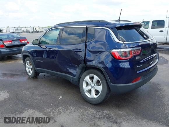 2018 Jeep Compass Latitude with VIN 3C4NJDBB2JT150463, listed as a IAAI auction lot 42452301 with 73,895 mi miles and . Bid and sale history available at DreamBid. Image 3.