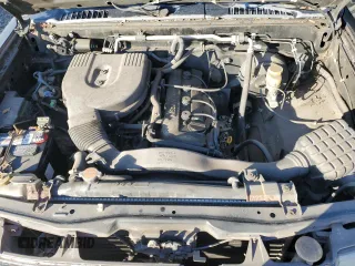 1998 Nissan Frontier XE z VIN 1N6DD21S1WC340005, wystawiony jako Copart lot #83630474 z przebiegiem 164 423 mil mil oraz Szkoda całkowita • Salvage title. Historia ofert i sprzedaży dostępna na DreamBid. Obrazek 11.