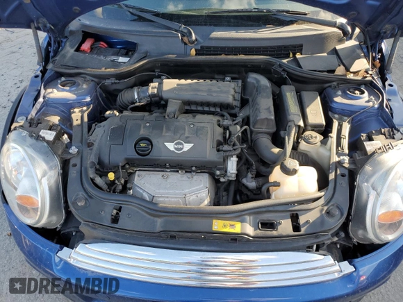 2012 MINI Convertible with VIN WMWZN3C54CT134060, listed as a Copart auction lot 43740175 with 71,818 mi miles and Salvage title. Bid and sale history available at DreamBid. Image 11.