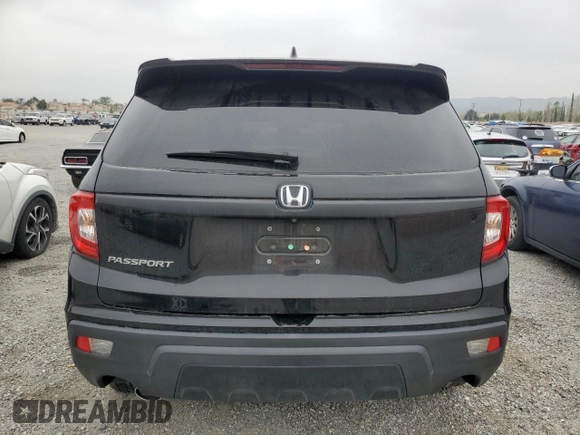 2021 Honda Passport EX-L with VIN 5FNYF7H53MB010524, listed as a Copart auction lot 50022685 with 18,882 mi miles and Salvage title. Bid and sale history available at DreamBid. Image 6.