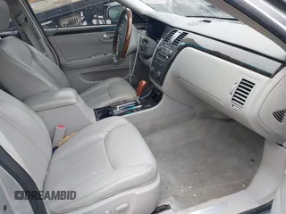 2011 Cadillac DTS Luxury Collection z VIN 1G6KD5E6XBU107790, wystawiony jako IAAI lot #41943638 z przebiegiem 150 543 mil mil oraz . Historia ofert i sprzedaży dostępna na DreamBid. Obrazek 5.