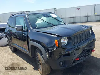 2017 Jeep Renegade Trailhawk z VIN ZACCJBCB4HPE54731, wystawiony jako IAAI lot #42282950 z przebiegiem 101 418 mil mil oraz . Historia ofert i sprzedaży dostępna na DreamBid. Obrazek 13.
