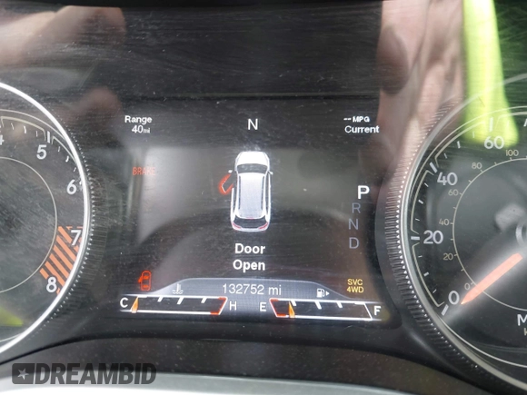 2015 Jeep Cherokee Trailhawk with VIN 1C4PJMBS5FW792184, listed as a IAAI auction lot 41827106 with 132,752 mi miles. Bid and sale history available at carsss.com. Image 7.
