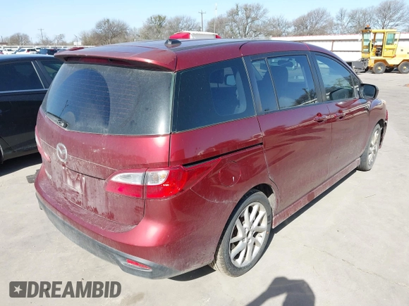 2012 Mazda Mazda5 Grand Touring with VIN JM1CW2DL1C0132281, listed as a IAAI auction lot 41698161 with 121,179 mi miles. Bid and sale history available at carsss.com. Image 4.