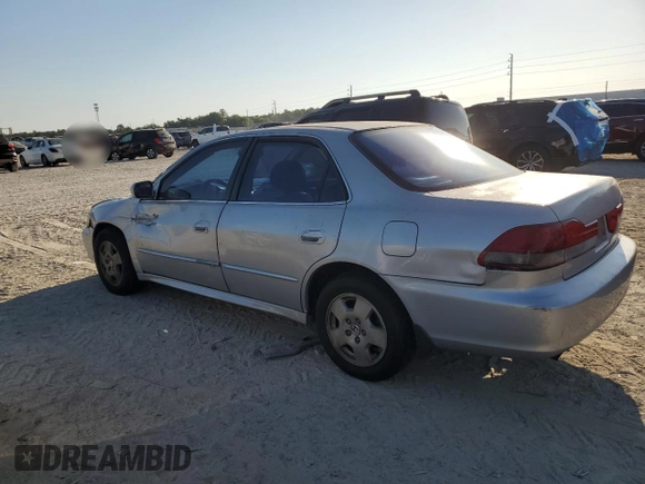 2001 Honda Accord EX z VIN 1HGCG16531A063589, wystawiony jako Copart lot #57875015 z przebiegiem Nie podano mil oraz Szkoda całkowita • Salvage title. Historia ofert i sprzedaży dostępna na DreamBid. Obrazek 2.