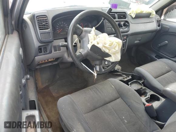 2001 Nissan Frontier XE z VIN 1N6DD26S71C315501, wystawiony jako Copart lot #55604945 z przebiegiem 202 275 mil mil oraz Szkoda całkowita • Salvage title. Historia ofert i sprzedaży dostępna na DreamBid. Obrazek 8.