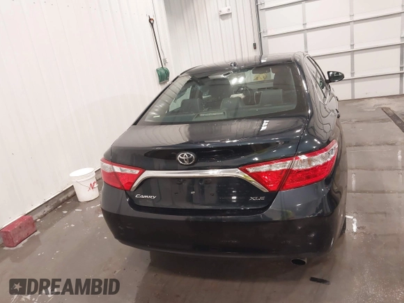 2015 Toyota Camry XLE with VIN 4T1BF1FK7FU906861, listed as a IAAI auction lot 41753920 with 92,389 mi miles and . Bid and sale history available at DreamBid. Image 16.