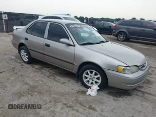 2000 Toyota Corolla VE with VIN 2T1BR12E6YC356371, listed as a IAAI auction lot 42420076 with 208,883 mi miles and . Bid and sale history available at DreamBid. Image 1.