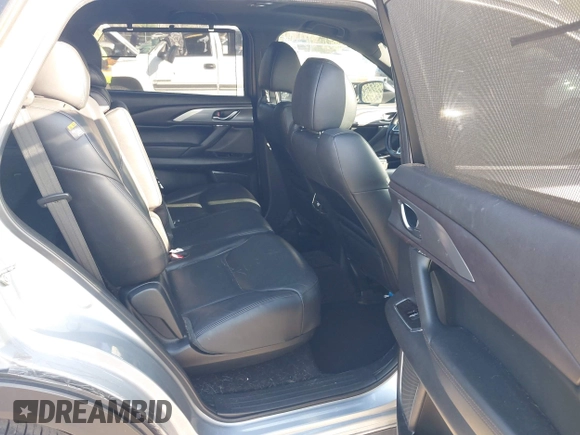 2017 Mazda CX-9 Grand Touring with VIN JM3TCADY5H0138176, listed as a IAAI auction lot 41458610 with 114,664 mi miles and . Bid and sale history available at DreamBid. Image 8.