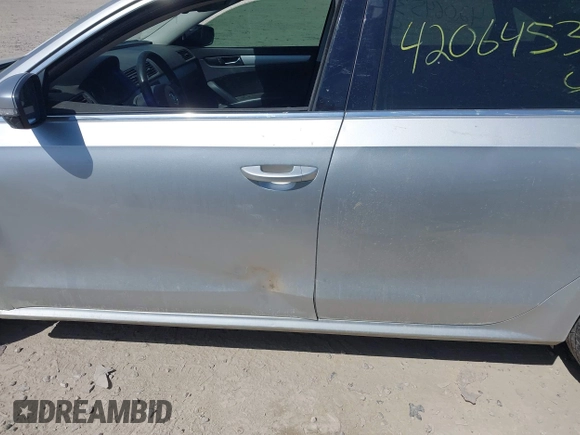 2013 Volkswagen Passat SE with VIN 1VWBN7A39DC078905, listed as a IAAI auction lot 42064537 with 185,853 mi miles and . Bid and sale history available at DreamBid. Image 14.