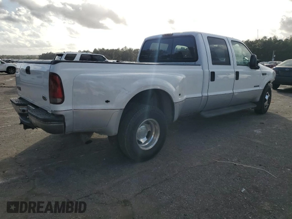 2001 Ford F-350 XL with VIN 1FTWW32F81ED76171, listed as a Copart auction lot 85030524 with 294,338 mi miles and Salvage title. Bid and sale history available at DreamBid. Image 3.