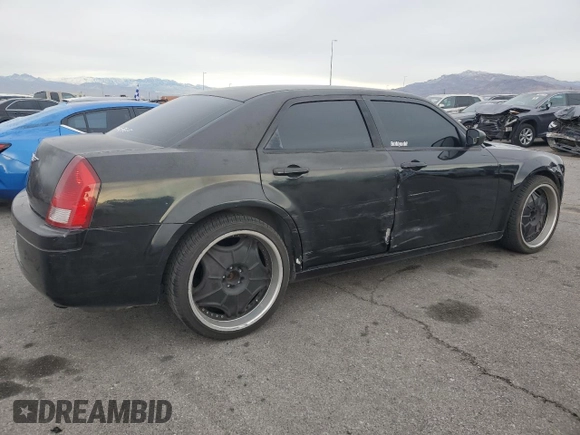 2007 Chrysler 300 with VIN 2C3KA43R77H862729, listed as a Copart auction lot 49006665 with 113,437 mi miles and Salvage Title. Bid and sale history available at carsss.com. Image 3.