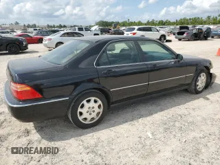 1999 Acura RL with VIN JH4KA9657XC005748, listed as a Copart auction lot 67048184 with 0 mi miles and Salvage Title. Bid and sale history available at carsss.com. Image 3.