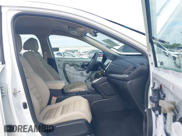 2018 Honda CR-V LX with VIN 2HKRW5H30JH414854, listed as a IAAI auction lot 42003596 with 26,322 mi miles and . Bid and sale history available at DreamBid. Image 5.