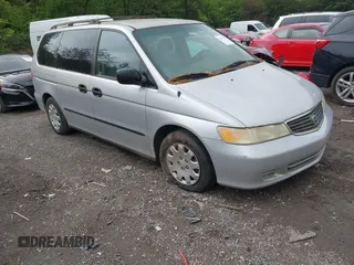 2001 Honda Odyssey LX with VIN 2HKRL185X1H617608, listed as a IAAI auction lot 42097014 with 198,623 mi miles and . Bid and sale history available at DreamBid. Image 1.