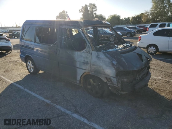 2001 Volkswagen EuroVan MV с VIN WV2NB47061H099148, выставлен на аукционе Copart как лот 77123813 с пробегом Не указан миль и На запчасти • Non repairable. История ставок и продаж доступна на DreamBid. Изображение 4.