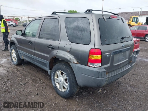 2003 Ford Escape XLT Popular 2 with VIN 1FMYU93133KD90533, listed as a IAAI auction lot 42361131 with 172,326 mi miles and . Bid and sale history available at DreamBid. Image 3.
