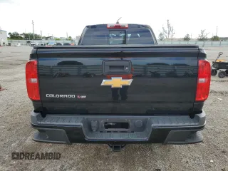 2018 Chevrolet Colorado z VIN 1GCHSDEN1J1251680, wystawiony jako Copart lot #76588774 z przebiegiem 83 630 mil mil oraz Szkoda całkowita • Salvage title. Historia ofert i sprzedaży dostępna na DreamBid. Obrazek 6.