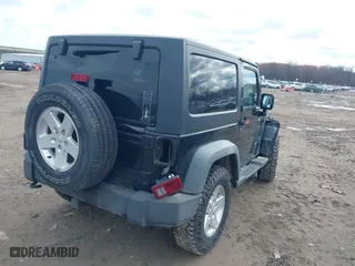 2011 Jeep Wrangler Sport with VIN 1J4AA2D1XBL634783, listed as a IAAI auction lot 41928702 with 154,379 mi miles. Bid and sale history available at carsss.com. Image 4.