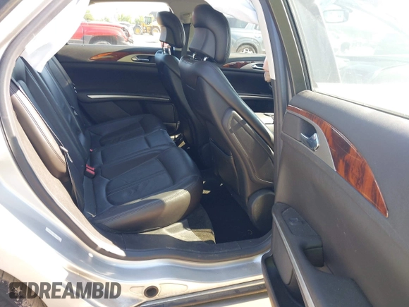 2014 Lincoln MKZ Hybrid with VIN 3LN6L2LU5ER822663, listed as a IAAI auction lot 42656735 with 122,025 mi miles and . Bid and sale history available at DreamBid. Image 8.
