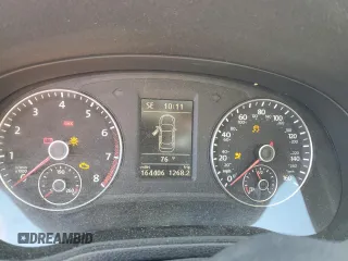 2012 Volkswagen Passat SE с VIN 1VWBP7A36CC060600, выставлен на аукционе Copart как лот 57233625 с пробегом 164 406 миль миль и Списание • Salvage title. История ставок и продаж доступна на DreamBid. Изображение 9.