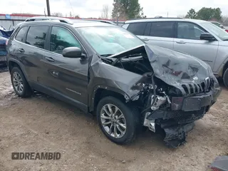 2019 Jeep Cherokee Latitude Plus z VIN 1C4PJLLB1KD154822, wystawiony jako IAAI lot #41487283 z przebiegiem 97 903 mil mil oraz . Historia ofert i sprzedaży dostępna na DreamBid. Obrazek 1.