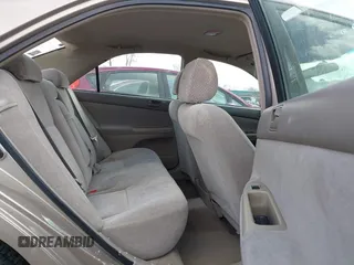2003 Toyota Camry LE with VIN 4T1BE32KX3U123873, listed as a IAAI auction lot 42085492 with 166,901 mi miles and . Bid and sale history available at DreamBid. Image 8.