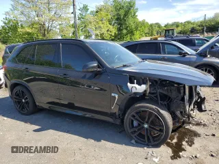 2018 BMW X5 M z VIN 5YMKT6C54J0Y83460, wystawiony jako Copart lot #57874275 z przebiegiem 58 656 mil mil oraz Szkody całkowita. Historia ofert i sprzedaży dostępna na DreamBid. Obrazek 4.