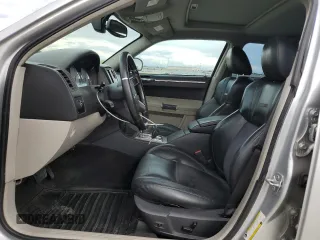 2007 Chrysler 300 C SRT8 with VIN 2C3LA73W07H660214, listed as a Copart auction lot 70283834 with 249,130 mi miles and Salvage Title. Bid and sale history available at carsss.com. Image 7.