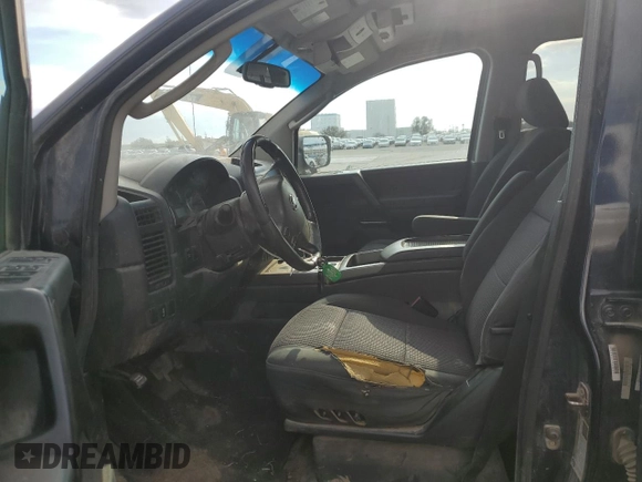2010 Nissan Titan SE with VIN 1N6BA0EDXAN318890, listed as a Copart auction lot 43797075 with 260,208 mi miles and Salvage Title. Bid and sale history available at DreamBid. Image 7.