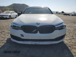 2019 BMW 5 Series 530e с VIN WBAJA9C54KB389629, выставлен на аукционе Copart как лот 52256265 с пробегом 112 642 миль миль и Списание • Salvage title. История ставок и продаж доступна на DreamBid. Изображение 5.