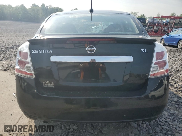 2011 Nissan Sentra SR z VIN 3N1AB6APXBL617718, wystawiony jako Copart lot #59629985 z przebiegiem 60 685 mil mil oraz Szkoda całkowita • Salvage title. Historia ofert i sprzedaży dostępna na DreamBid. Obrazek 6.