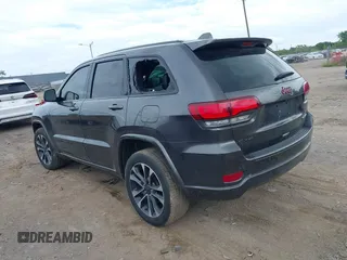 2021 Jeep Grand Cherokee 80th Anniversary with VIN 1C4RJFBG8MC728364, listed as a IAAI auction lot 39803814 with 34,000 mi miles and . Bid and sale history available at DreamBid. Image 3.