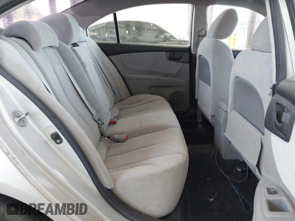 2009 Kia Optima LX z VIN KNAGE228795357008, wystawiony jako IAAI lot #42228948 z przebiegiem 148 194 mil mil oraz . Historia ofert i sprzedaży dostępna na DreamBid. Obrazek 8.
