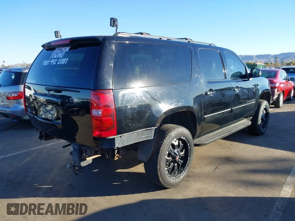 2007 Chevrolet Suburban LT with VIN 3GNGK26K47G206089, listed as a IAAI auction lot 41409657 with 156,789 mi miles and . Bid and sale history available at DreamBid. Image 4.
